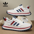 Λευκά παπούτσια adidas με ρετρό στυλ και πολύχρωμες ρίγες